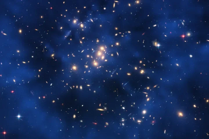 1. Dark Matter: The Invisible Cosmic Glue